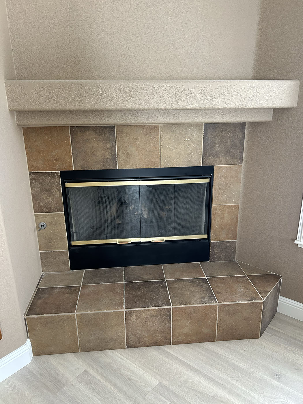 Fireplace area before painting